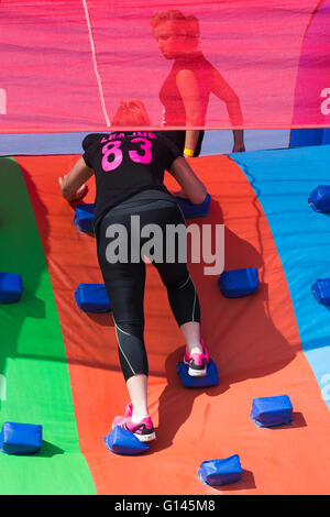 Poole, Dorset, UK. 8th May, 2016.  Foam Fest Dorset takes place at Baiter Park, Poole.  Runners dodge, dive, climb and laugh their way through a hilarious foam filled obstacle course for a 3k fun run organised by Naomi House and Jacksplace children’s hospices.  Credit:  Carolyn Jenkins/Alamy Live News Stock Photo