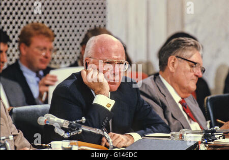 United States Senator Patrick Leahy (Democrat of Vermont) listens to the testimony of Professor Anita Hill before the US Senate Judiciary Committee to confirm Judge Clarence Thomas as Associate Justice of the US Supreme Court in the US Senate Caucus Room in Washington, DC on October 11, 1991. Thomas was nominated for the position by US President George H.W. Bush on July 1, 1991 to replace retiring Justice Thurgood Marshall. US Senator Howell Heflin (Democrat of Alabama) is seen at the right side of the photo. Credit: Arnie Sachs/CNP Stock Photo