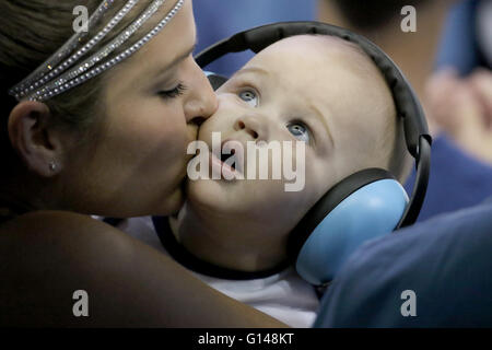 Tampa, Florida, USA. 8th May, 2016. DOUGLAS R. CLIFFORD | Times.Danielle Thesing, left, kisses her 8-month-old son, Ethan Thesing, of Orlando, during the second period of SundayÃ¢â‚¬â„¢s (5/8/16) game between the Tampa Bay Lightning and the New York Islanders for game five of the second round of the Stanley Cup Playoffs. © Douglas R. Clifford/Tampa Bay Times/ZUMA Wire/Alamy Live News Stock Photo