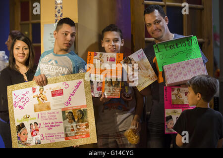 Kansas City, Missouri, USA. 5th Mar, 2016. The Reyes family holds up sponsorship and fundraising posters and a donation raffle box for Daisy Reyes. From left to right is Joanna, Jorge, Jose (Jr.), Jose (father), and Angel (backfacing). Daisy, a sophomore at Belton High School in Cass County, Kansas City, will be the 2016 Miss Cover Girl entrant for Kansas. The final Miss Cover Girl pageant will be held in Las Vegas. © Serena S.Y.Hsu/ZUMA Wire/Alamy Live News Stock Photo