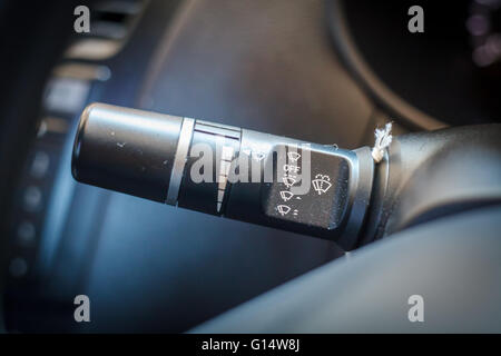 Wipers control buttons in car interior. Stock Photo