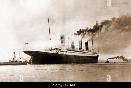 The Titanic steamship was the largest ship ever built at the time. In 1912, the ship sailed from Southampton, England to New York City. On April 14th, 1912 the ship struck an iceberg near Grand Banks and sank the next day. Only about 700 people survived o Stock Photo