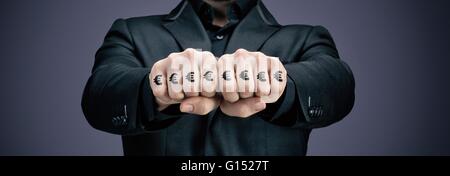 Businessman tattooed fists Stock Photo