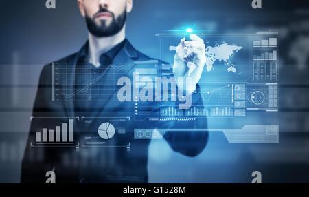 Young business man writing on a virtual screen Stock Photo
