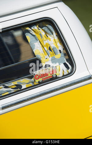 Carry on camping sticker in the window of a VW Volkswagen camper van Stock Photo