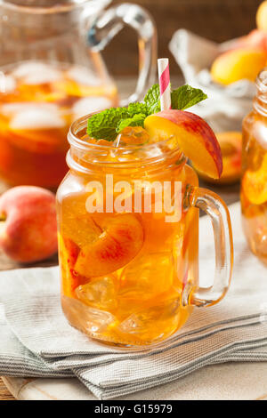 Fresh Homemade Peach Sweet Tea With Mint Stock Photo - Alamy