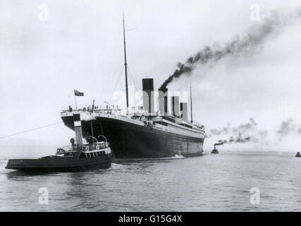 The completed Titanic steamship at Belfast, Ireland. The Titanic was the largest ship ever built at the time, measuring 268 meters long and weighing 67,000 tonnes. The Titanic's hull had 16 watertight compartments and many people thought that these made i Stock Photo