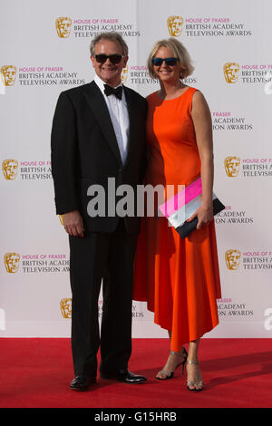 London, UK. 8 May 2016. Actor Hugh Bonneville with wife Lucinda Evans. Red carpet  celebrity arrivals for the House Of Fraser British Academy Television Awards at the Royal Festival Hall. Stock Photo