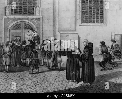 1830 lithograph show a crowd has gathered to watch as Martin Luther directs the posting of his 95 theses, protesting the practice of the sale of indulgences, to the door of the castle church in Wittenberg. Martin Luther (1483-1546) was a German priest, pr Stock Photo