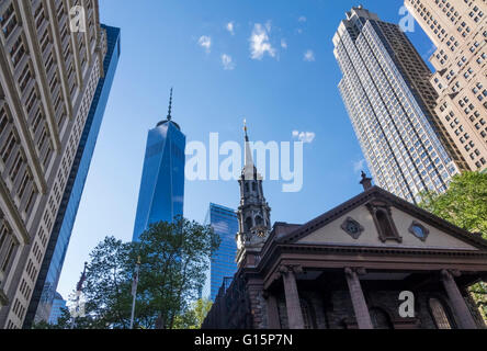 St. Paul's Chapel and it's tower seen against the Freedom Tower of the World Trade Center Stock Photo