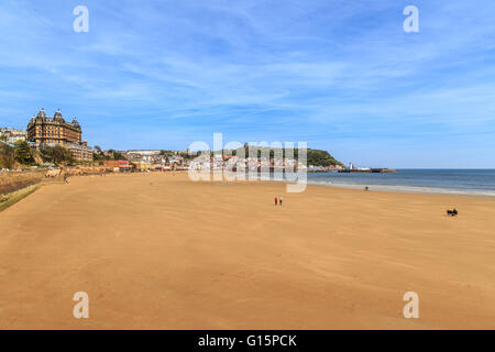 Various people on Scarborough beach, on a hot day in May 2016. Stock Photo