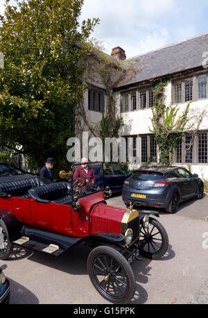 1915 Model T Ford and Churston Court Hotel, Churston Ferrers, Brixham, Devon. Stock Photo