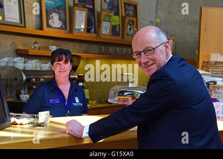 Edinburgh, Scotland, United Kingdom, 09, May, 2016. Deputy First Minister John Swinney and Scottish Parliament barista Kirsty Rafferty as he takes a break for a coffee on the first working day for newly-elected MSPs in the Scottish Parliament, Credit:  Ken Jack / Alamy Live News Stock Photo