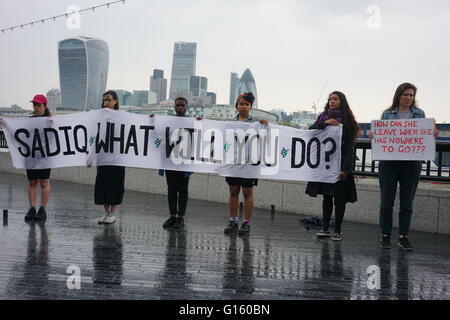 London, UK. 9th May, 2016. Sister hold a demonstration to demand Sadiq Khan for more funding to London's domestic violence services are in crisis. 2/3 of women who approach a London refuge for help are turned away and Sadiq is not really bored of domestic violence which it affect is own Asian community as well as other at the front of City Hall. Credit:  See Li/Alamy Live News Stock Photo