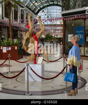 Southport, Merseyside, UK. 10th May, 2016. Southport Arts May Festival 2016. 'The Fall of Icarus’ by Phyllis Lim B.A. Honours, UCL exhibit on display in Wayfarers Arcade part of the traditional Victorian Shopping Arcade in the town. It illustrates that pride comes before a fall! The story could be interpreted in various ways depending on individual perception. It could be read as a metaphor for freedom, ambition, courage, tenacity, or conversely for failure, mortality and a reminder of the fragility of life. Stock Photo