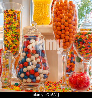 Jars of an Assortment of Colorful Candies. Square. Stock Photo