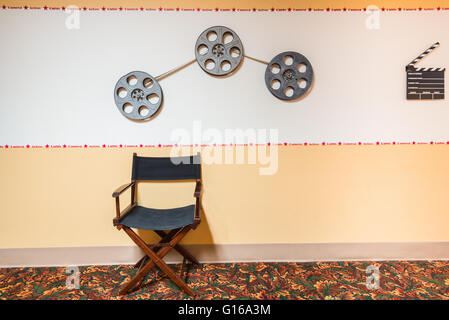 Movie reel with film and clapboard Stock Photo - Alamy