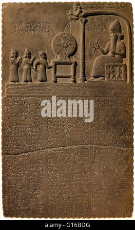 The Tablet of Shamash is a stone tablet recovered from the ancient Babylonian city of Sippar in southern Iraq in 1881. The bas-relief on the top of the obverse shows Shamash, the Sun God, beneath symbols of the Sun, Moon and Venus. He is depicted in a sea Stock Photo