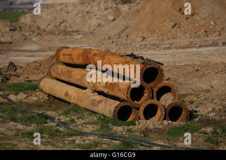 Six damaged rusty pipes Stock Photo
