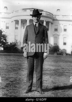 President Coolidge standing on south lawn of White House, February 26, 1925. John Calvin Coolidge, Jr. (July 4, 1872 - January 5, 1933) was the 30th President of the United States (1923-1929). A Republican lawyer from Vermont, Coolidge worked his way up t Stock Photo