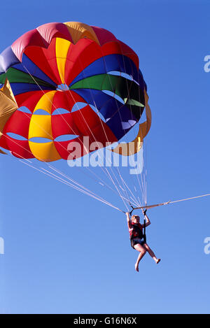 Parasailing, Osoyoos, Okanagan, BC, British Columbia, Canada - Young Girl hanging from Parasail Stock Photo
