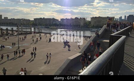 Sunny holiday in Park Gorkogo in Moscow. Stairs to quay and secondary gates. Pople crowd are moving to park on 07 May 2017 Stock Photo