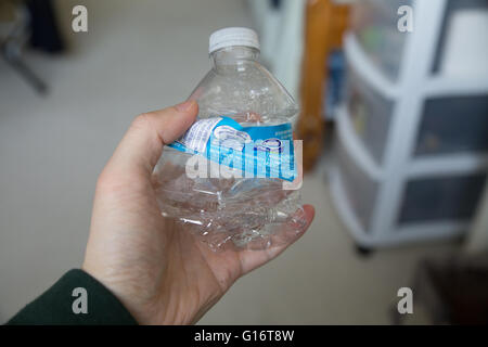 Crumpled Plastic Bottle squeezed water bottle Stock Photo