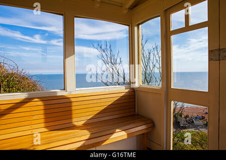 A view inside one of the carriages of the East Lift Train that takes visitors up to the Clifftop from the seafront in Hastings, Stock Photo