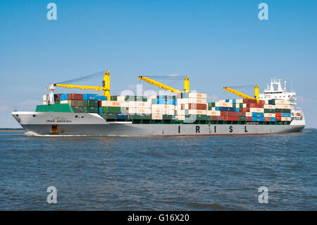 Container ship Iran Ardebil leaving port of Rotterdam in the Netherlands Stock Photo