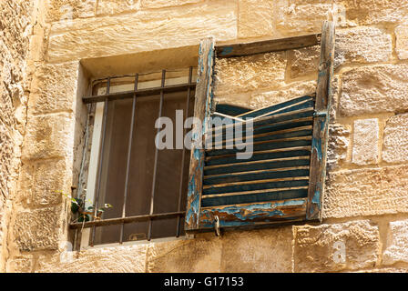 Old broken window in the Old City in Jerusalem, Israel. Stock Photo