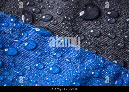 Rain water droplets on fiber waterproof fabric Stock Photo