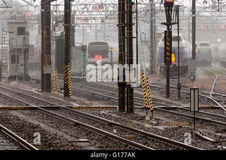 Rainy day at japanese railway station with many railways Stock Photo