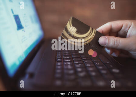 close-up man's hand using notebook for shopping online. Stock Photo