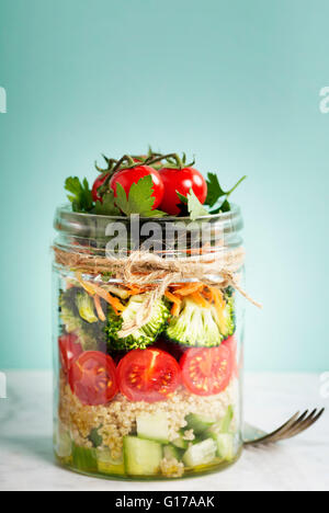 Healthy Homemade Mason Jar Salad with Quinoa and Vegetables - Healthy food, Diet, Detox, Clean Eating or Vegetarian concept Stock Photo