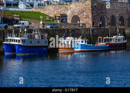 Boats in Seahouses Harbour Stock Photo