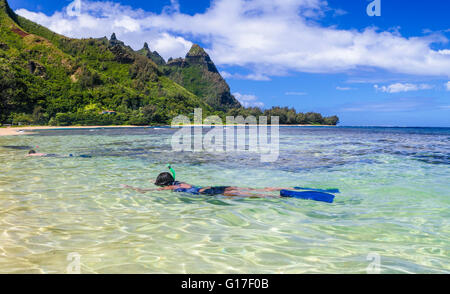 Snorkelers at Tunnels Beach on Kauai Stock Photo