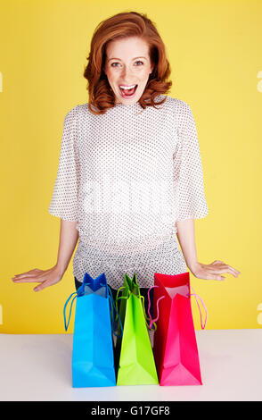 Excited Woman With Shopping Bags Stock Photo