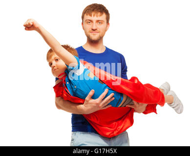 Super hero kid having fun with his dad Stock Photo