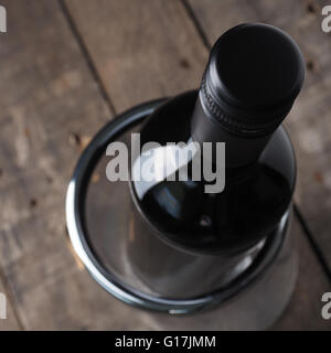 Bottle of wine with view from above, selective focus on top Stock Photo