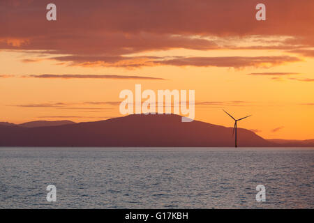 Sunrise over Walney Offshore Wind Farm off the Cumbrian Coast in the UK Stock Photo