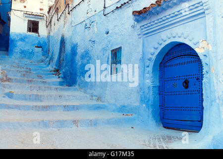 Blue-washed staircase in the old town of Chefchaouen, Morocco Stock Photo