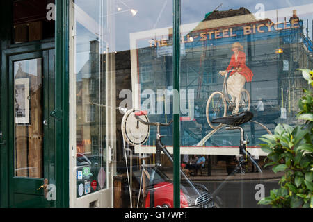 Old bicycle outside antiques shop, Tours, France Stock Photo - Alamy