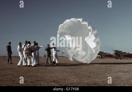 Instructor Explaining Operation of Parachute to Student Pilots, Meacham Field, Fort Worth, Texas, USA, Arthur Rothstein for Farm Security Administration, January 1942 Stock Photo