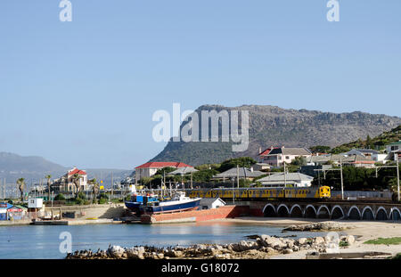 KALK BAY WESTERN CAPE SOUTH AFRICA . A suburban train on the coastal line to Cape Town seen here passing through Kalk Bay Stock Photo