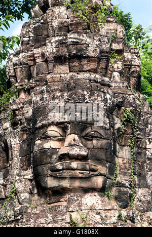 The Bayon is a well-known and richly decorated Khmer temple at Angkor in Cambodia. Built in the late 12th or early 13th century Stock Photo