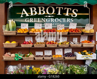 Greengrocers fruits & vegetables fresh spring British local farmers produce prices Abbotts Shop exterior traditional high street Shaftesbury Dorset UK Stock Photo