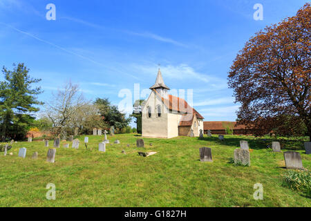 Wisley Church exterior, a small historic building in Wisley village, Surrey, UK dating back to Norman times in about 1150 on a sunny day with blue sky Stock Photo