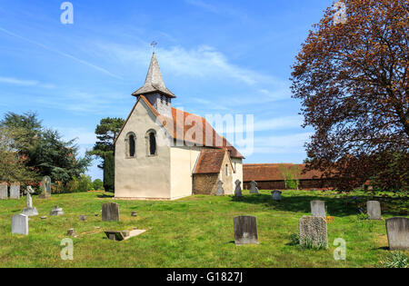 Wisley Church exterior, a small historic building in Wisley village, Surrey, UK dating back to Norman times in about 1150 on a sunny day with blue sky Stock Photo