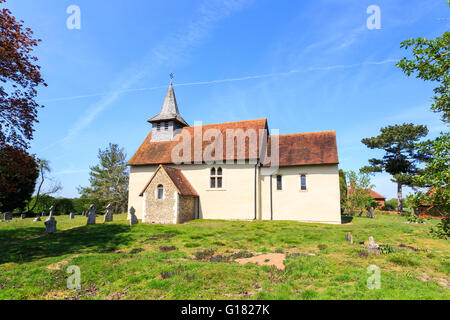 Wisley Church exterior, a small historic building in Wisley village, Surrey, UK dating back to Norman times in about 1150 on a sunny day with blue sky Stock Photo