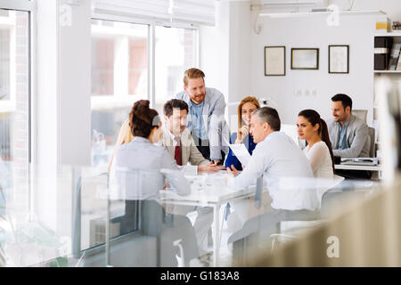 Business people and architects discussing future plans Stock Photo